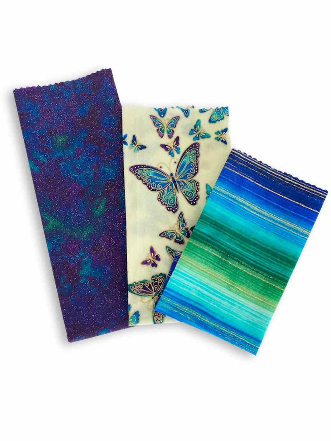 Good Soul Shop Set of three beeswax food wraps in purple butterfly pattern fanned out