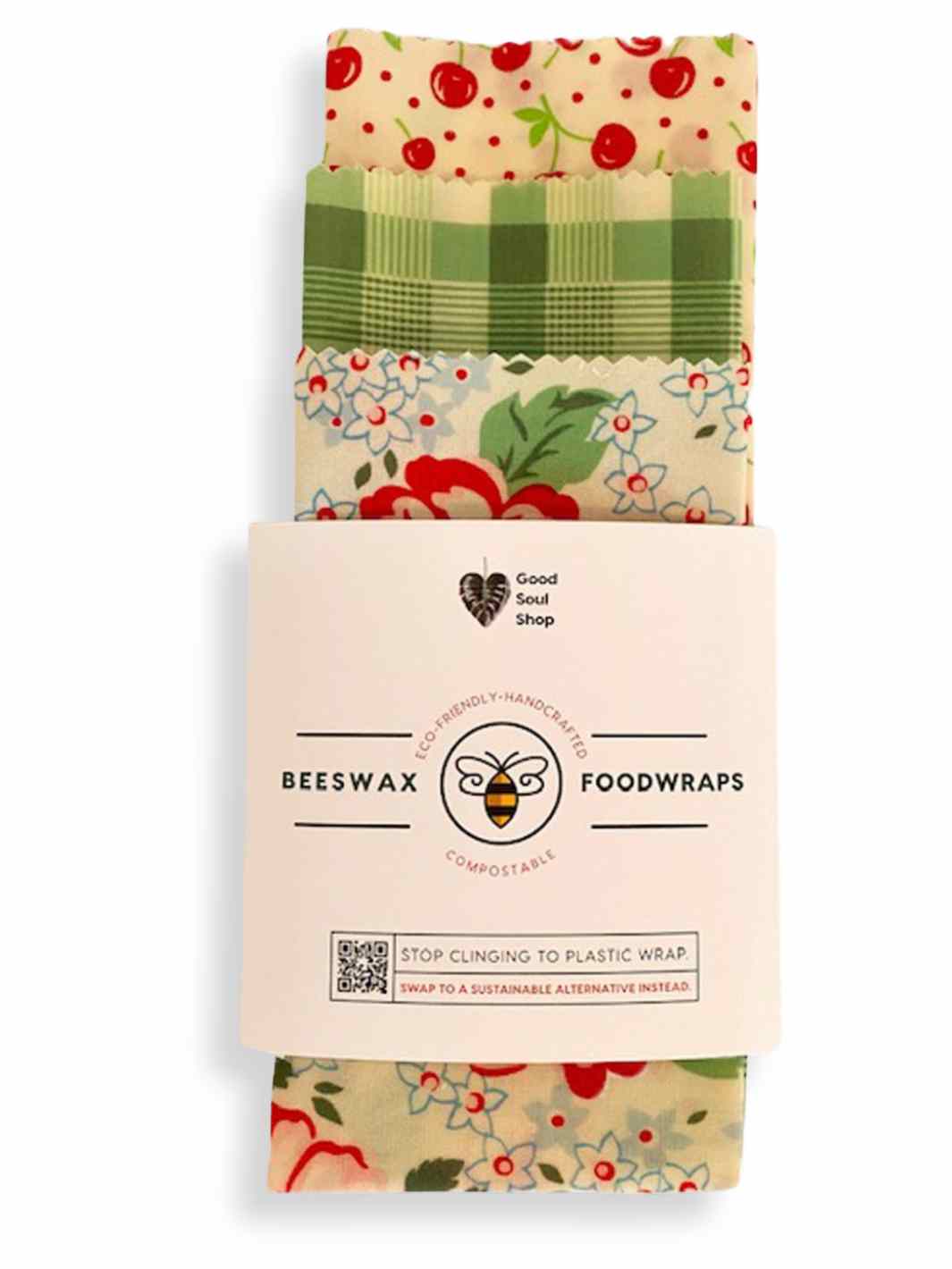 Good Soul Shop Set of three beeswax food wraps in red cherries, green plaid, and red floral pattern