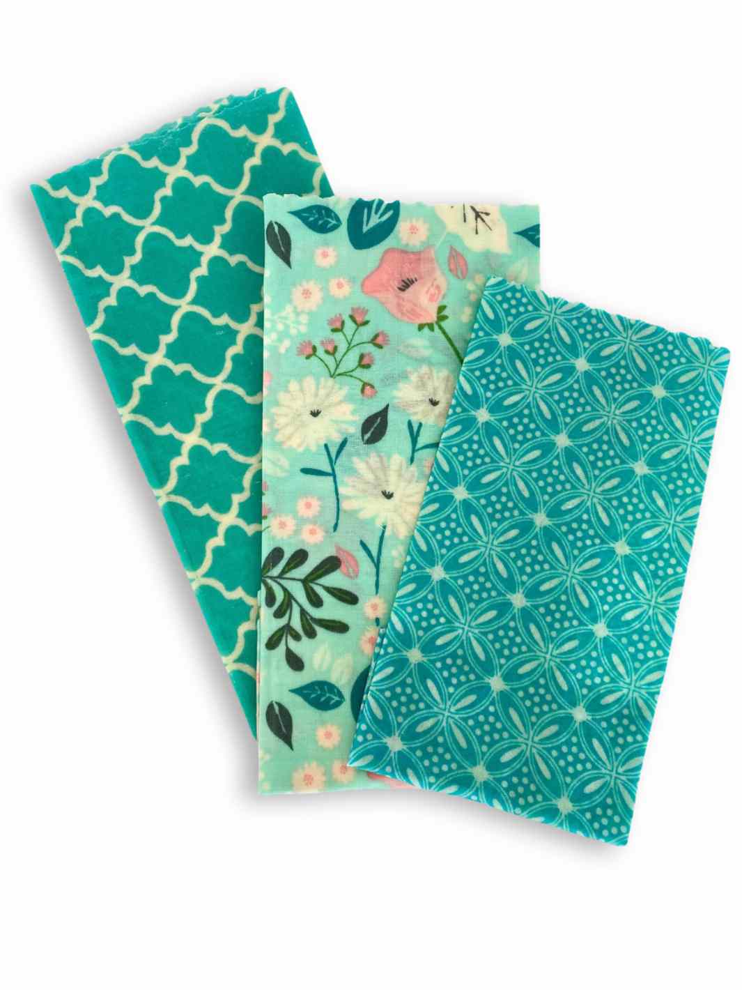 Good Soul Shop Set of three beeswax food wraps in teal floral and Moroccan lace pattern