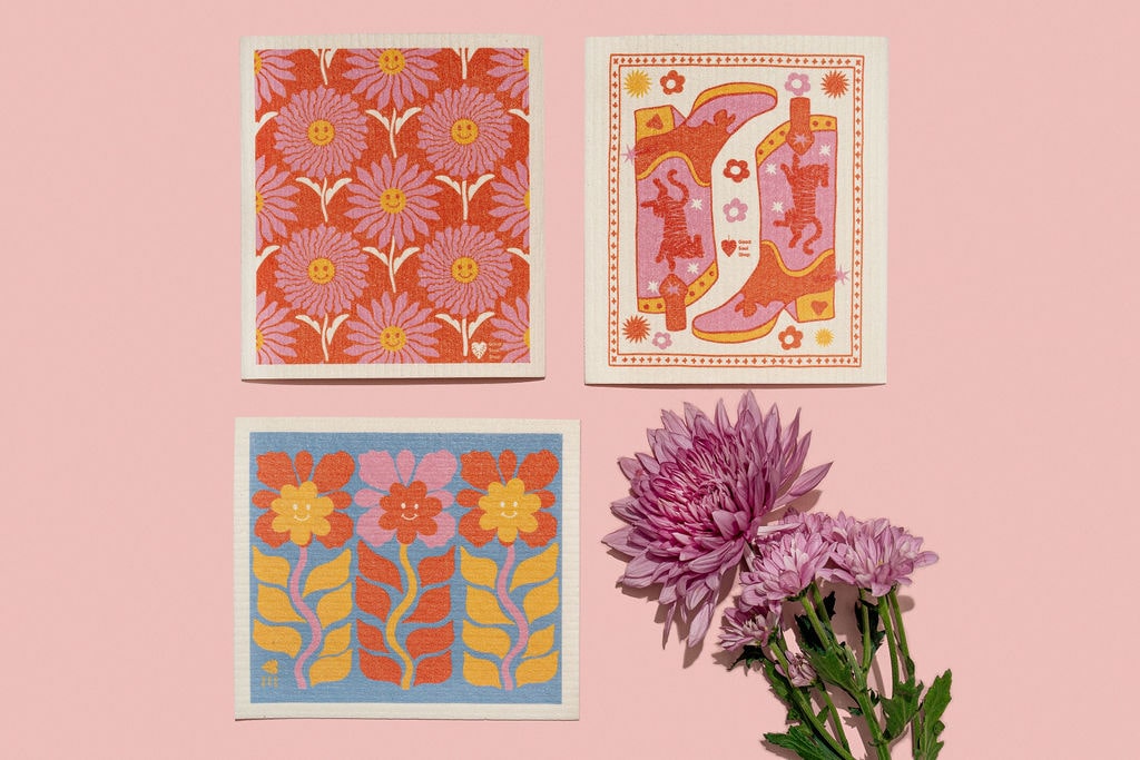 Good Soul Shop Swedish Dishcloths with cowgirl boots, tigers, and suflowers on a pink background