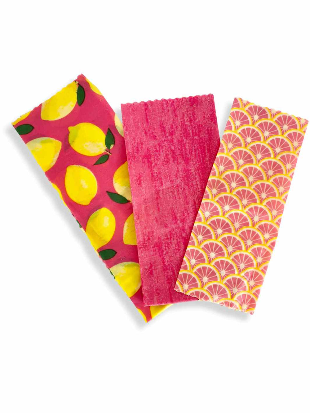 Good Soul Shop Set of three beeswax food wraps fanned out in pink lemon pattern